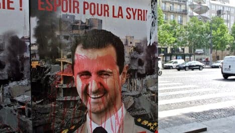 Hollande slams MPs over talks with Syria's Assad