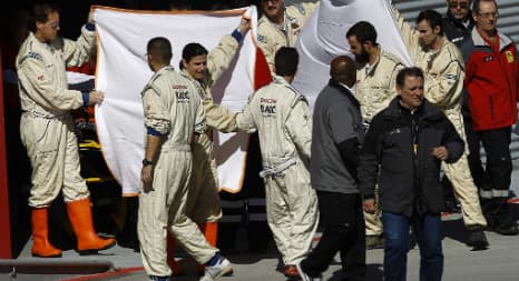Alonso gives a 'thumbs up' from hospital bed