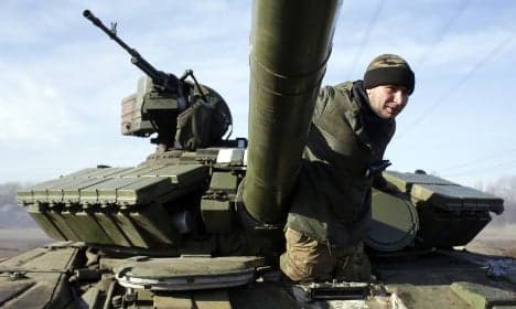 Paris hosts talks to save Ukraine peace deal
