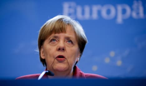 Merkel secures Russia sanctions extension