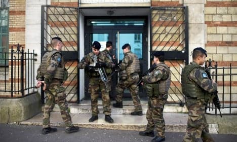 France to keep 10,000 'tired' troops on streets