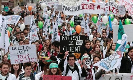 Doctors hit streets of Paris to protest reforms