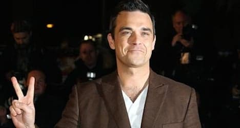 Robbie Williams lets cat out of bag on Paléo gig