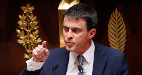 French PM forced to defend new spying laws