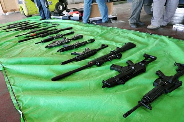 Police bust weapons smuggling ring