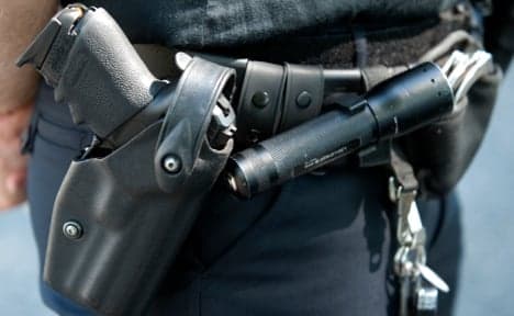 Cop's pistol vanishes during toilet break