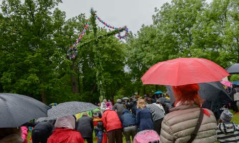 Rain dampens Swedish Midsummer madness