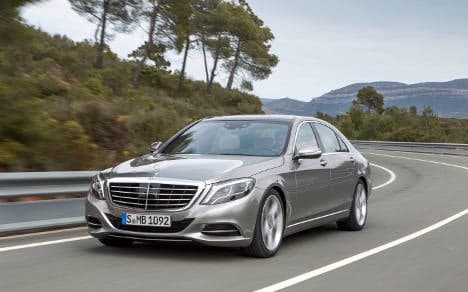 Record sales put Daimler in rivals' wing mirrors