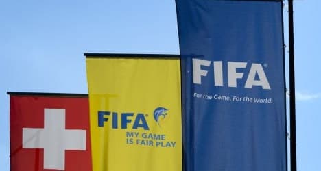 Crisis-hit FIFA sets election for February
