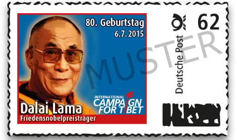 Activists give Dalai Lama 80th birthday stamp