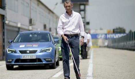 Blind drivers get behind the wheel on F1 track