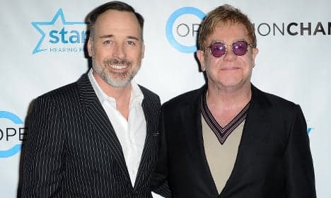 Elton John sues French media over 'rumours'
