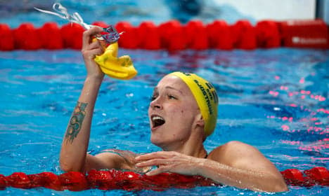 Sweden's golden girl swims to new record