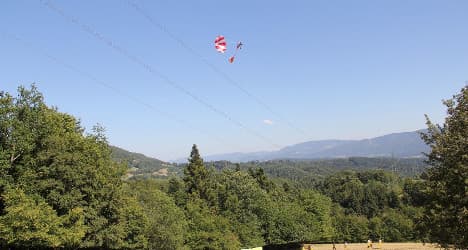 Paraglider trapped in power line drama