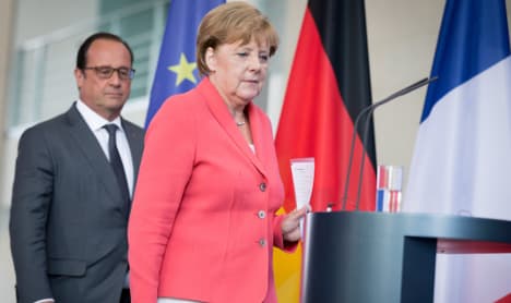 Merkel finally condemns anti-refugee violence