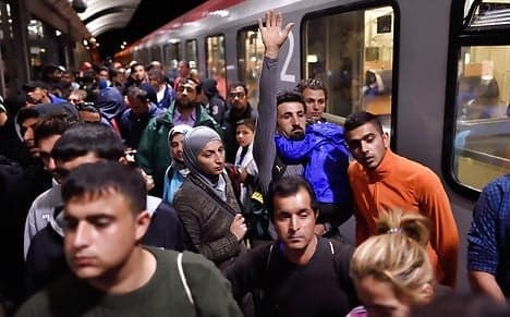 Refugees flee Danish police for Sweden