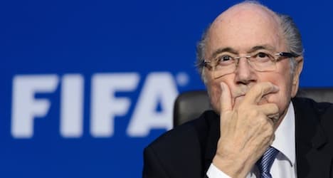 Blatter vows to stay on despite criminal probe