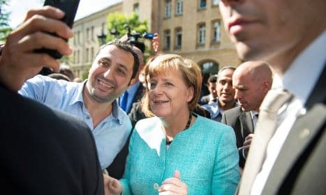 Poll: Merkel's popularity hit by refugee crisis