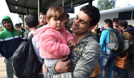 Merkel 'proud' as govt plans €6bn for refugees