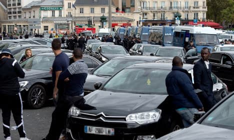 Paris Uber drivers protest fare reductions
