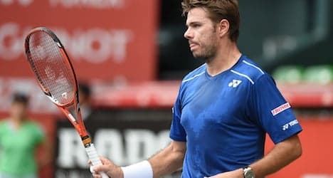 Wawrinka muscles through to Japan victory