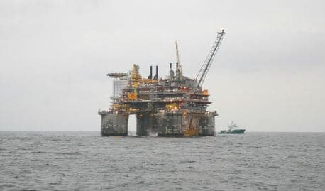 Norway to tap oil fund as revenues plummet