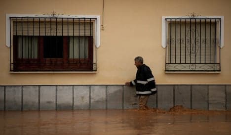 Schools closed and roads flooded as fierce storms batter southern Spain