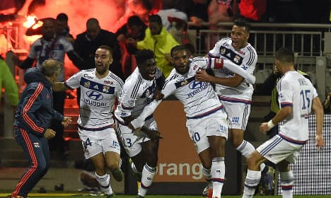 Lyon win derby clash as unbeaten PSG march on