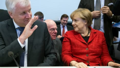 Merkel announces hard- fought refugee deal
