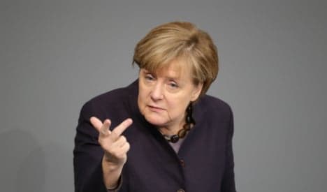 Merkel tries to hit tough-but-fair note on refugees