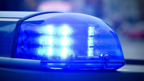Police arrest armed men at German school