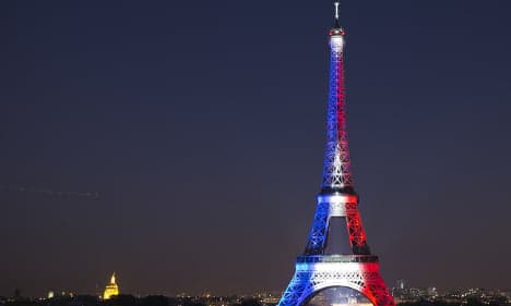 Eiffel Tower reopens with message of defiance