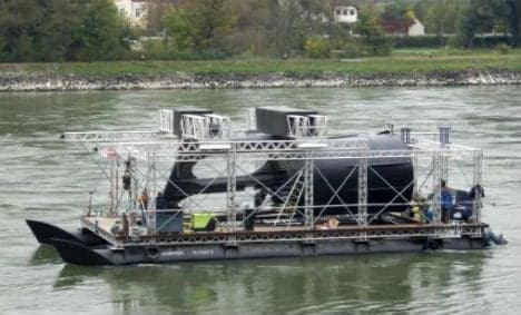 River turbines turn Austria's Danube green