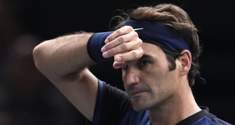 Wawrinka advances as Federer exits Paris Open