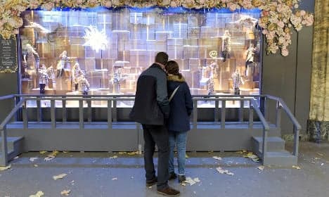 Shocked Parisians shun big stores after attacks