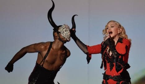 Spain welcomes matador Madonna as popstar vows 'show must go on'