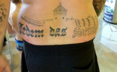 Far-right councillor gets jail term for Nazi tattoo