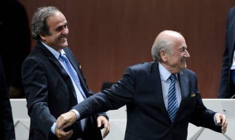 Frenchman Platini lands eight-year football ban