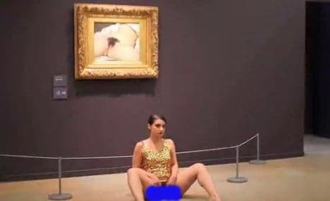 Artist arrested for another nude stunt at Paris gallery