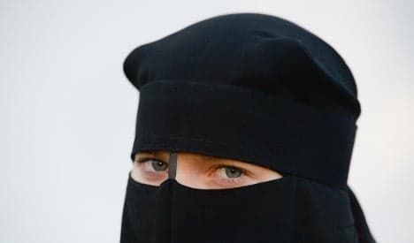 Bank ejects Muslim woman over full-face veil