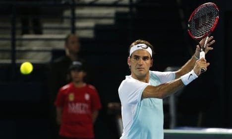 Federer blitzes Goffin to make Melbourne quarterfinals
