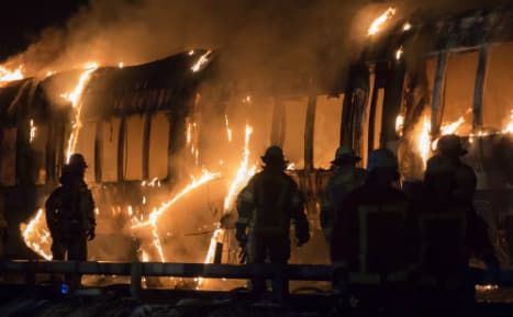 Hunt for cause of fire that gutted Berlin train