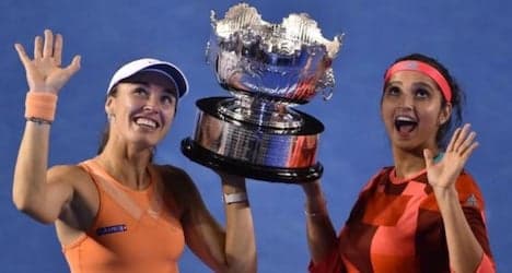 Hingis wins 12th Grand Slam with doubles win