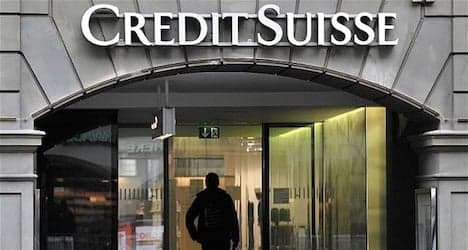 Credit Suisse posts first net loss since 2008