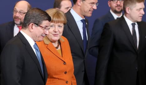 Merkel welcomes Turkey's plan to take back migrants