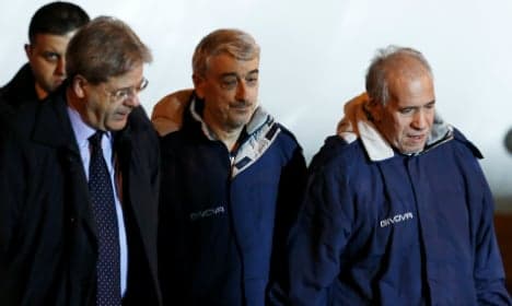 Freed hostages return to Italy from Libya
