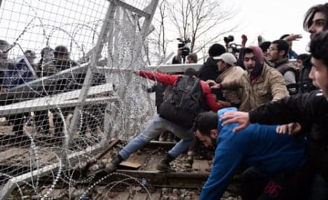 Desperate refugees stuck in Greece call for Merkel's help