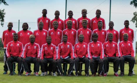 Footballers respond to racist attack with blackface photo