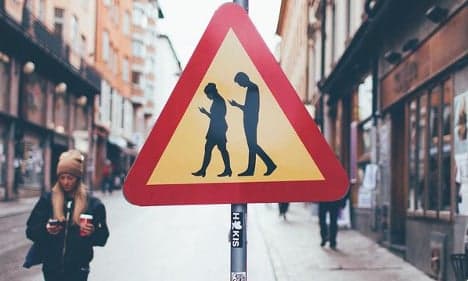 How Sweden's fake 'smombie' sign is being used for real