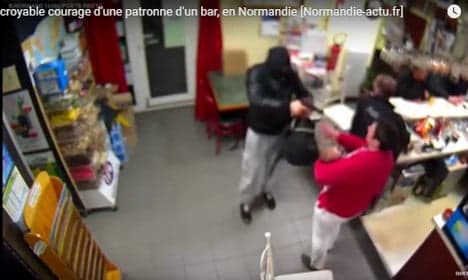 VIDEO: Frenchwoman with baby fights off armed robber